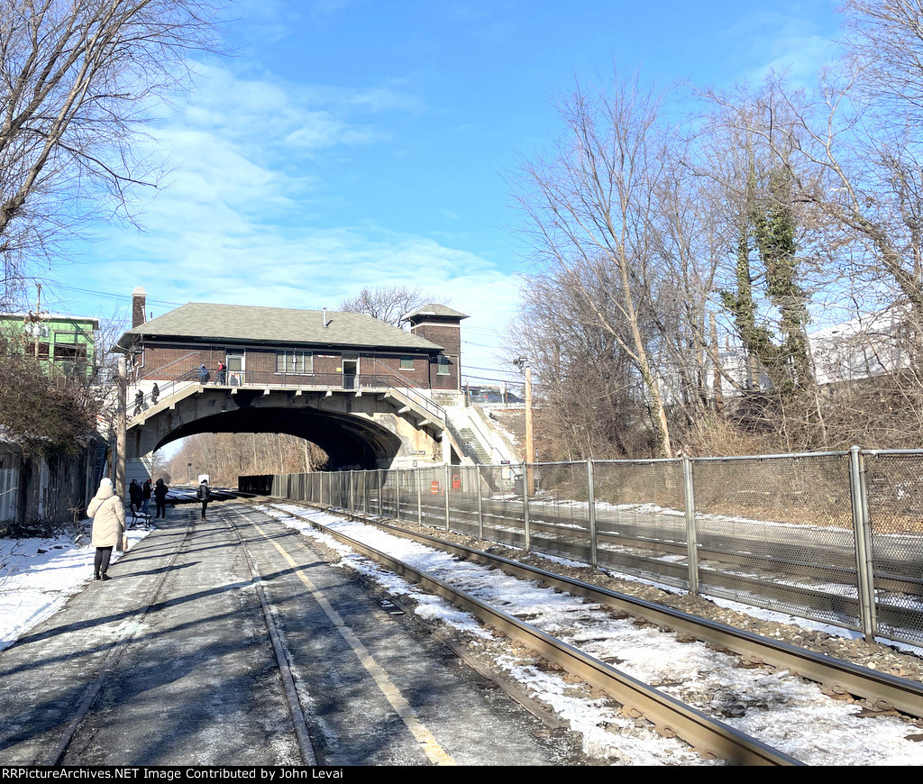 Looking west at Kingsland Sta as more passengers are heading down and waiting to board NJT Train # 1710 